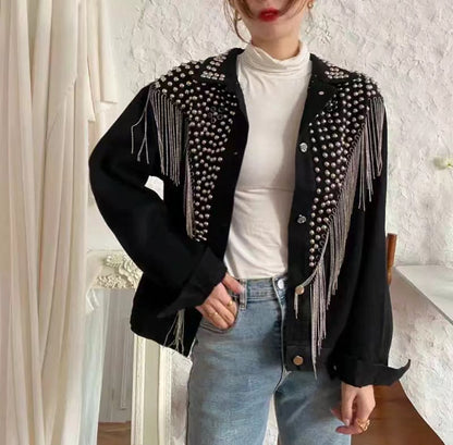 Loose fitting denim jacket with wicker fringe trim